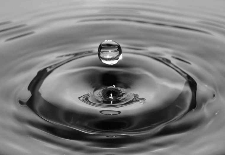 How to relax your mind and stop worrying? 4 - Your Happiness Institute black and white waves close up view circle